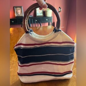 EUC The Sak crocheted handbag cream, navy, and red with faux wood handles.